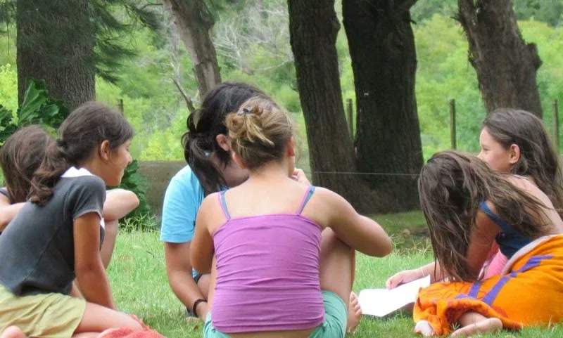 Girls spending time together outdoors during a ministry experience