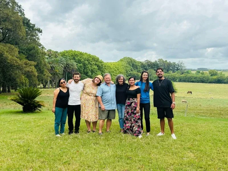 School of Connection participants standing together on the farm